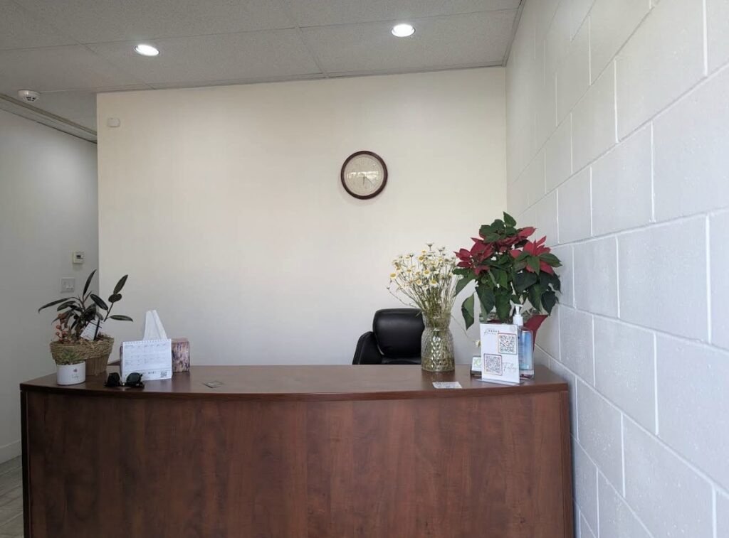 Modern clinic entrance with accessible features and inviting reception at Olive Physiotherapy in Langley